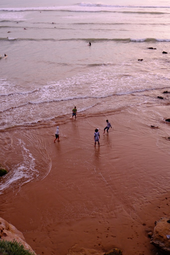 football at the beach